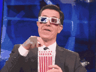 pre_1443720545__colbert_popcorn_eating.g